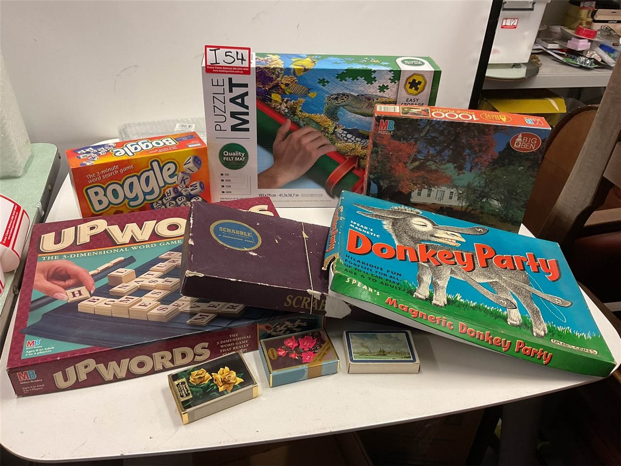 Puzzles And Games Boggle, Scrabble, Cards, Magnetic Pin The Tail On The Donkey, And Jigsaw Puzzle Mat Etc.