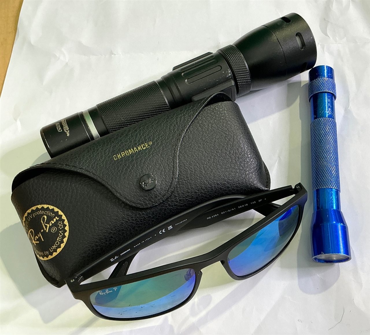 Torch x 2 & Pair of Sun Glasses (Scratched)