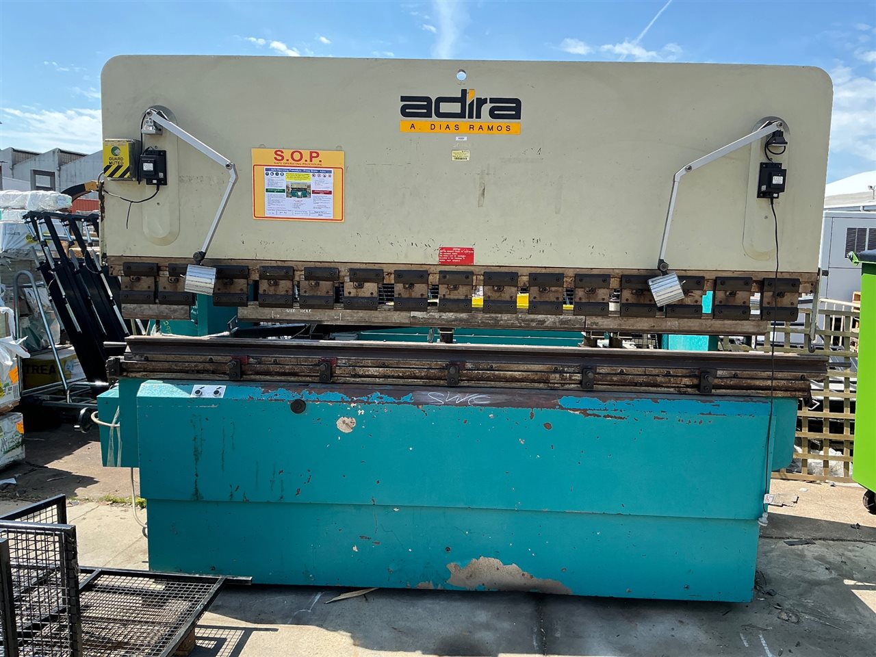 Pan Brake Press - Adira - Model Q H A -100 30 -Max Capacity 100 Ton (1000 Kn) - Max working Bending Length 3050 mm -(2540 mm Between Frames ) Max Hydraulic Pressure 30 - Stroke Miniumum 26 --Max -102 -3 Phase 415 Volt -  with Macson Red Eye 9100 Safety Unit , Steel Mesh Guarding with Tooling Accessories - Year of Manufacture 1998- ( - Buyer to Arrange Collection and Uplift with Crane to Remove ) Thumbnail