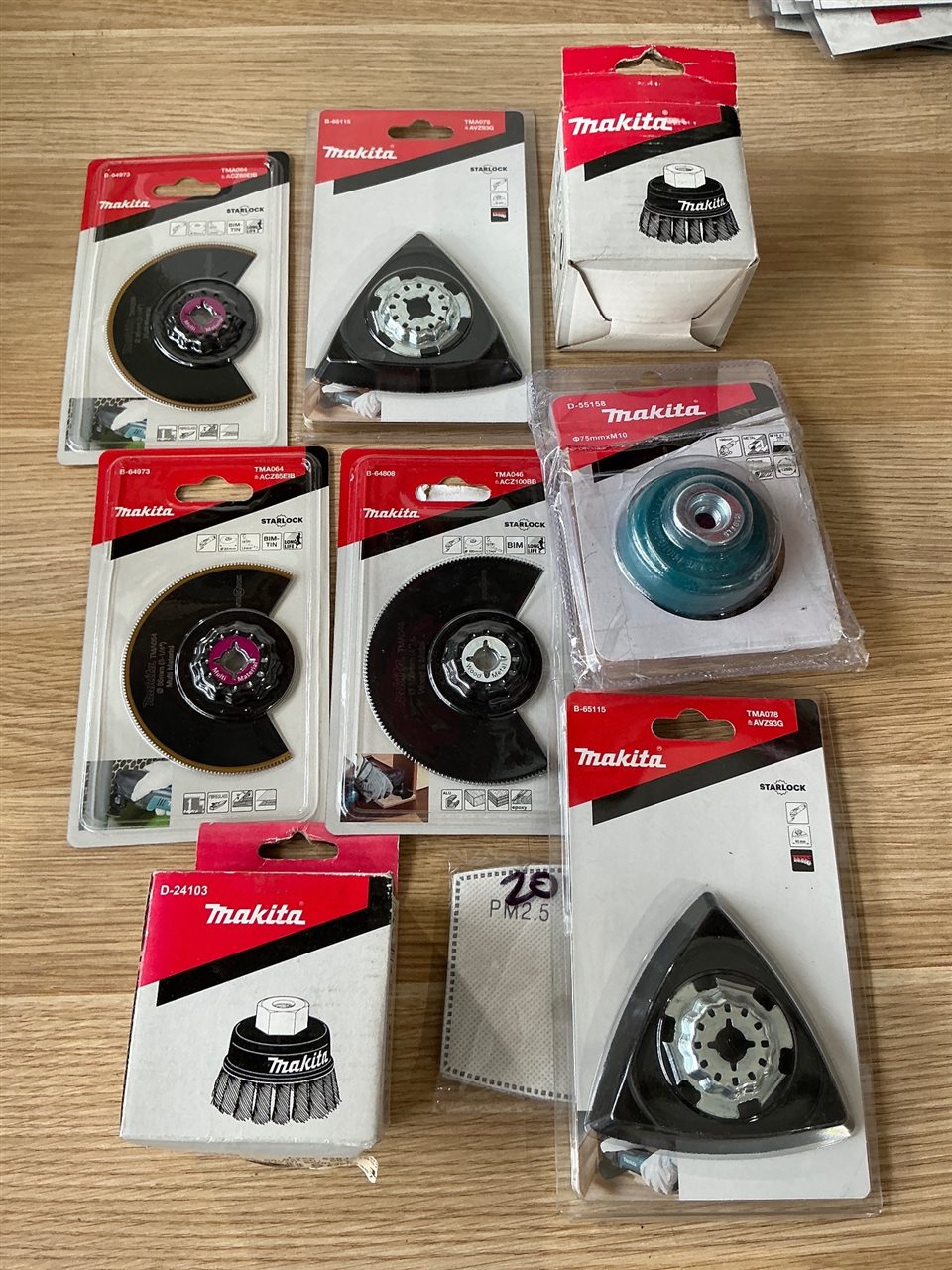 Quantity of 8 MAKITA Multi Tool Accessories and 3 Wire Brushes