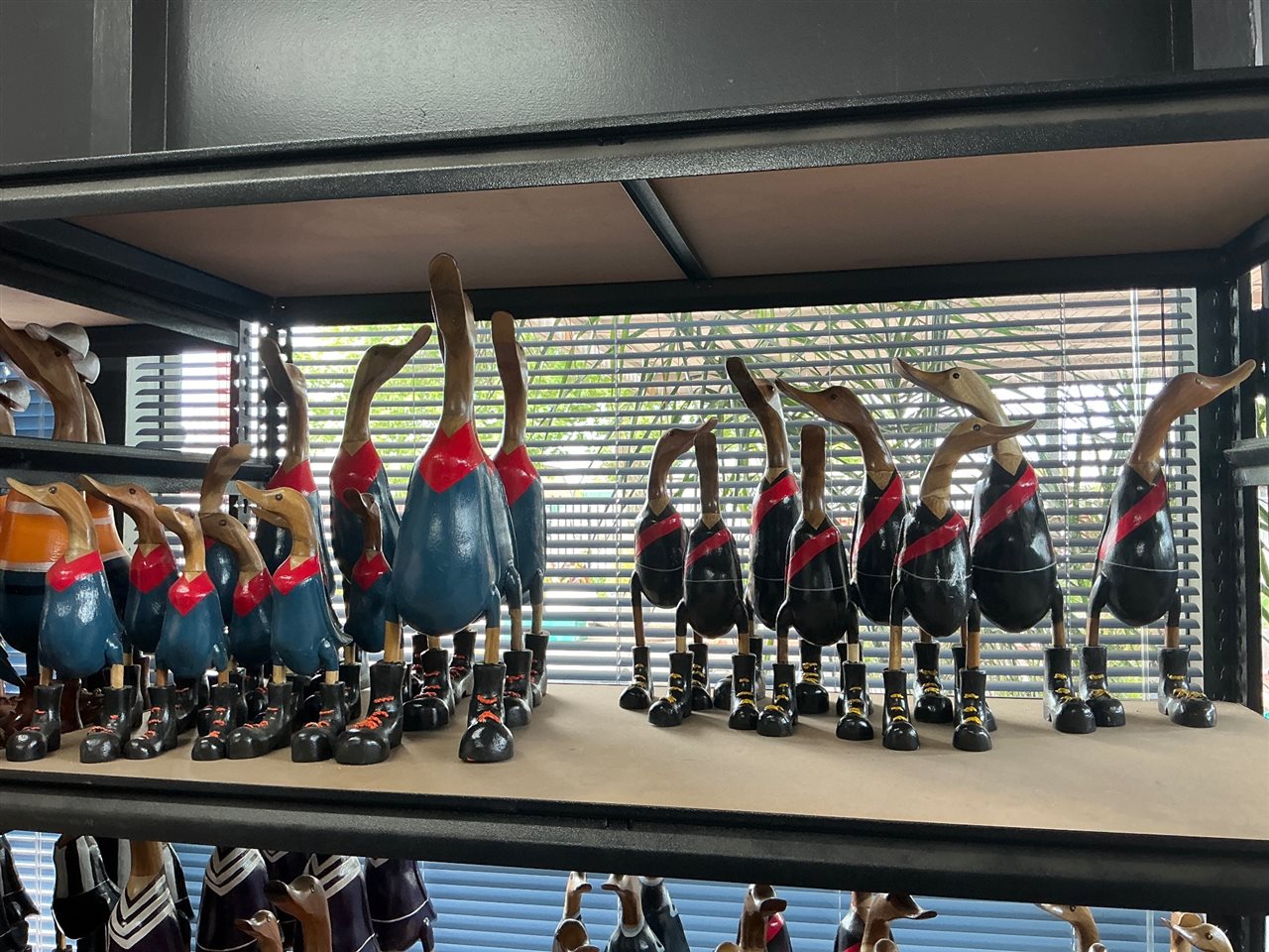 Lot of Approx 18 Carved Timber Ducks, Football Guernsey Colours