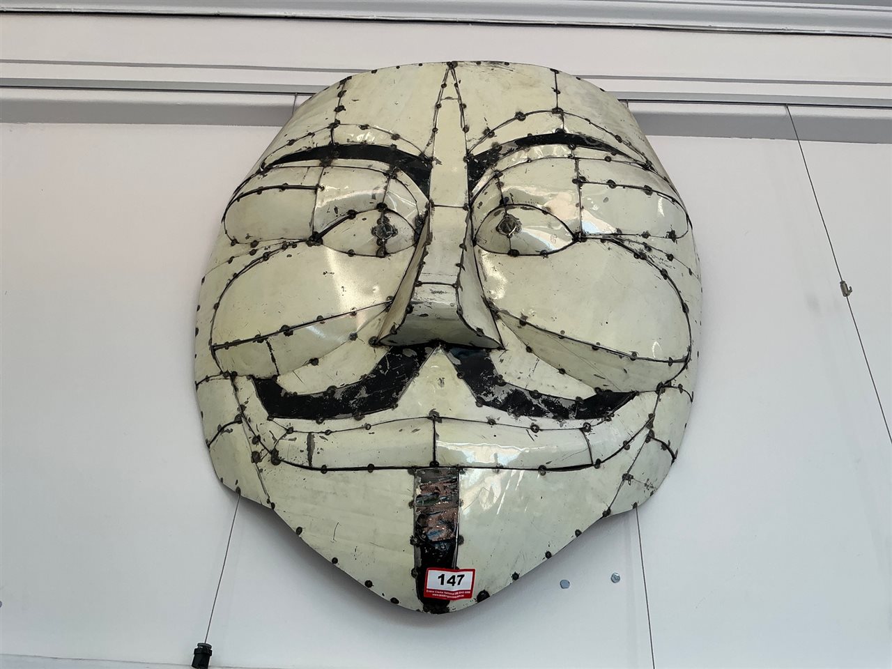 Large Riveted Metal Mask Wall Art, Cream with Black Detail