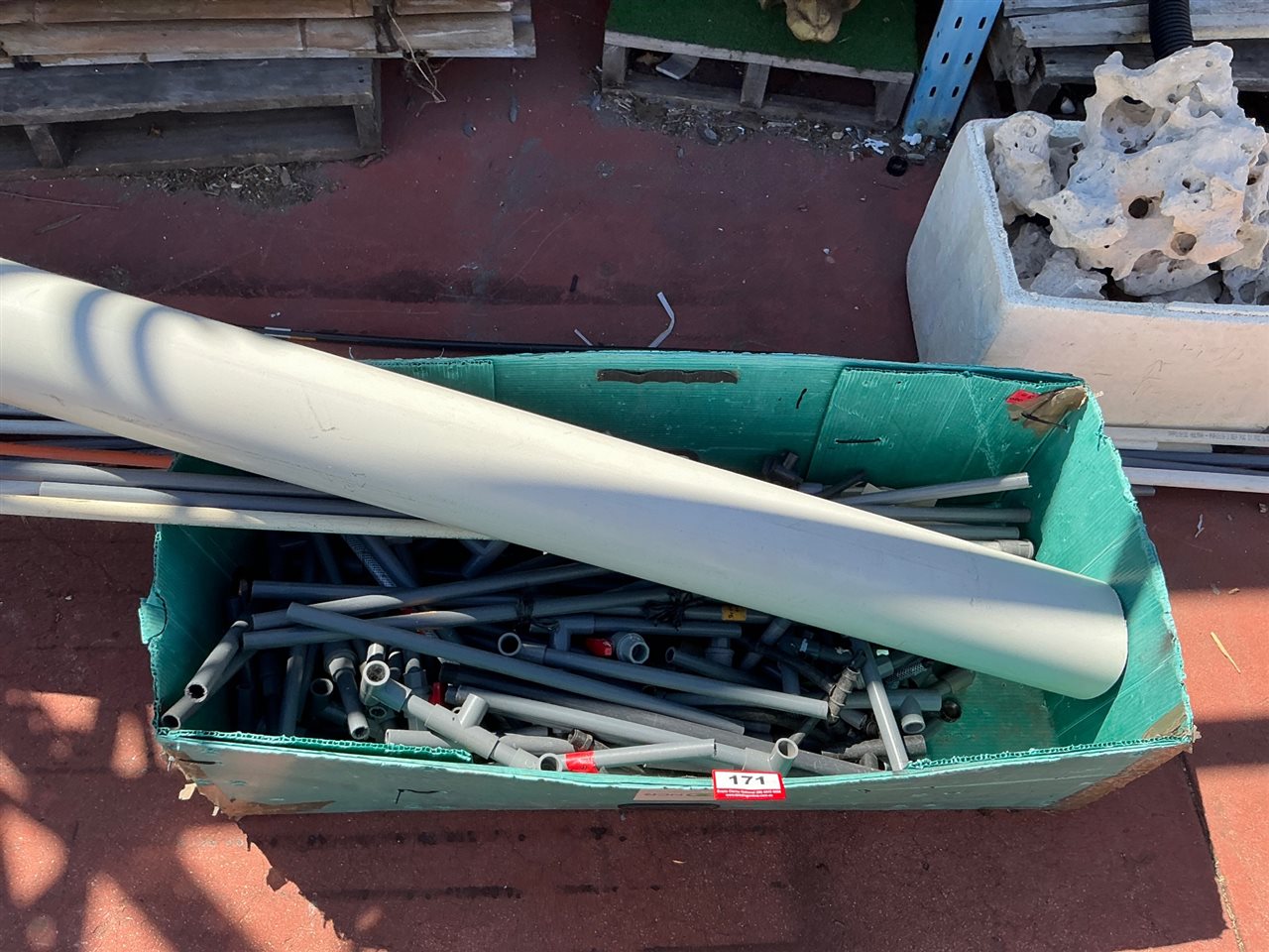 Crate of PVC Pipe Offcuts and Fittings with Large PVC Pipe