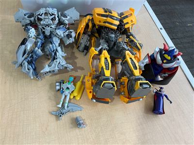 Transformers Bumblebee, Large Silver Transformer and Zurg Figures Thumbnail